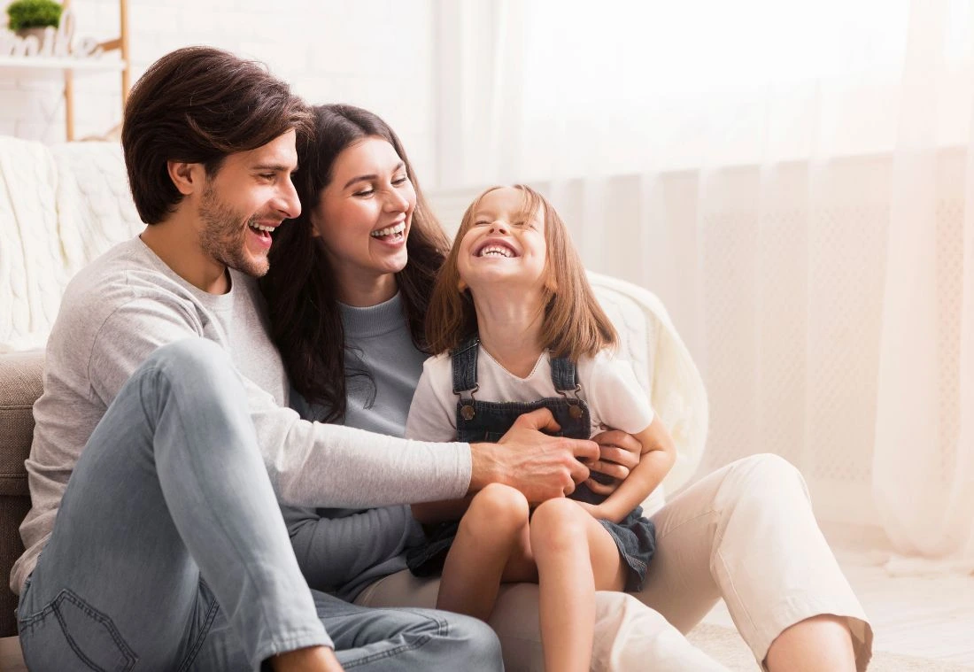 Happy family enjoying renewed joy after parents joined Marriage Helper Workshop Nashville TN