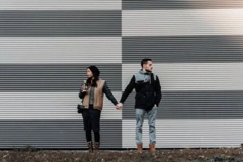Couple holding hands at the Couples Workshop by Marriage Helper