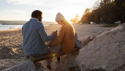Happy family watching the sunset in Brentwood, TN after participating in Marriage Helper Couples Workshop to fix their marriage