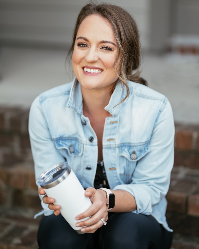 Dr. Kimberly Beam Holmes, CEO of Marriage Helper, smiling portrait
